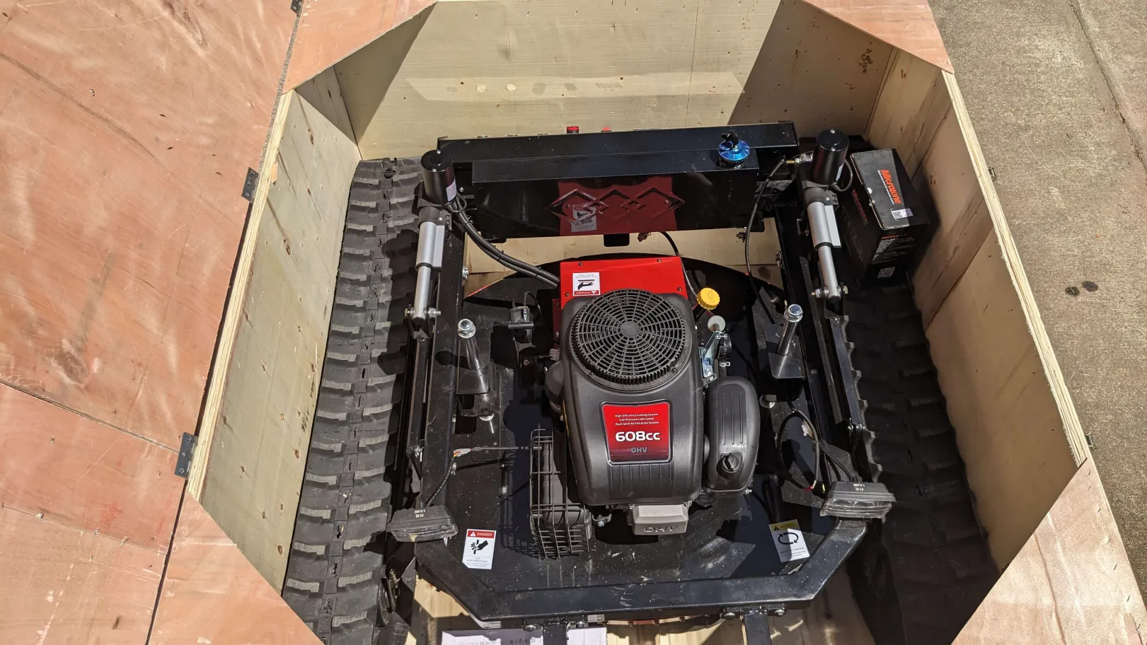Uncrating the mower close-up